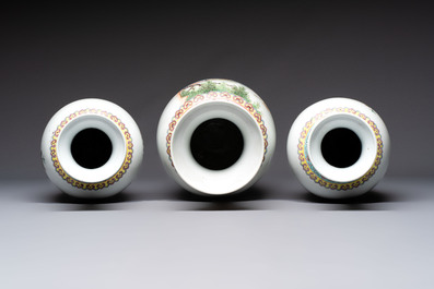 Seven Chinese famille rose vases, a scroll jar and a jardini&egrave;re on a stand, Qianlong marks, 20th C.