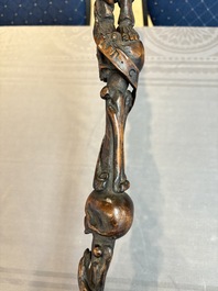 A finely carved boxwood 'vanitas' or 'memento mori' stick, 18/19th C.