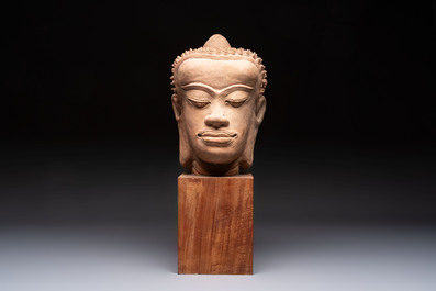 A Thai pottery Haripunjaya-style head of Buddha, possibly 13th C.