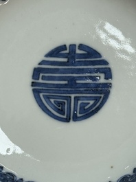 A pair of Chinese blue and white saucer dishes, Qianlong mark, 19th C.