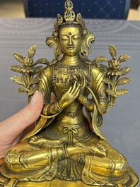 A fine Sino-Tibetan turquoise- and coral-inlaid gilt-bronze Buddha Maitreya, Kangxi