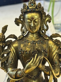 A fine Sino-Tibetan turquoise- and coral-inlaid gilt-bronze Buddha Maitreya, Kangxi