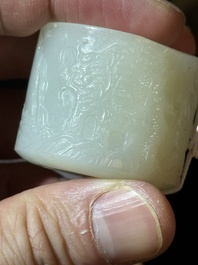 A fine Chinese white jade inscribed archer ring, Zigang 子岡 mark, 18th C.
