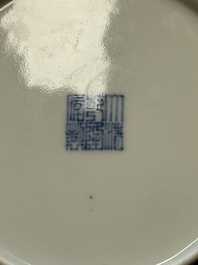 A Chinese blue and white 'lotus pond' plate, Qianlong mark, 19/20th C.