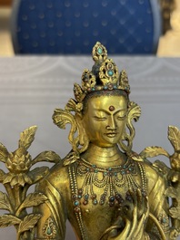 A fine Sino-Tibetan turquoise- and coral-inlaid gilt-bronze Buddha Maitreya, Kangxi