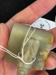 A Chinese celadon and russet jade 'dragon' seal, 18/19th C.