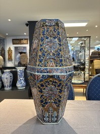 A rare Chinese hexagonal copper-red, blue and white brown-ground vase, 19th C.