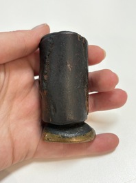 A Tibetan copper Gawu box and tsa tsa mold, 19th C.