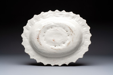 A large white-glazed 'Sunburst' oval dish, Saint-Jean-du-D&eacute;sert or Marseille, France, 17th C.