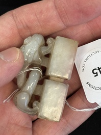 A Chinese celadon and russet jade 'chilong' seal, 18/19th C.