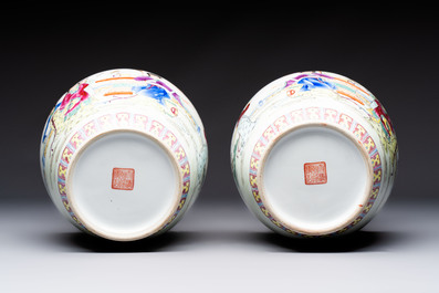 Seven Chinese famille rose vases, a scroll jar and a jardini&egrave;re on a stand, Qianlong marks, 20th C.