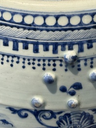 A Chinese blue and white 'birds among flowering branches' garden seat, 19th C.