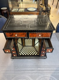 A small tortoiseshell-veneered cabinet of drawers with mirrored interior, Antwerp, 17th C.