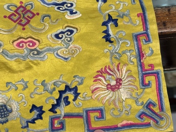 An imperial Chinese embroidered silk gold-thread yellow-ground cushion cover, Qianlong/Jiaqing