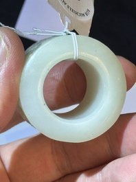 A fine Chinese white jade inscribed archer ring, Zigang 子岡 mark, 18th C.