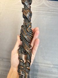 A finely carved boxwood 'vanitas' or 'memento mori' stick, 18/19th C.