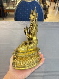 A fine Sino-Tibetan turquoise- and coral-inlaid gilt-bronze Buddha Maitreya, Kangxi