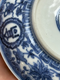 A pair of Chinese blue and white saucer dishes, Qianlong mark, 19th C.