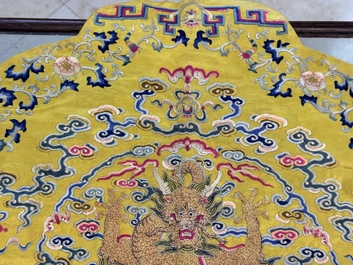 An imperial Chinese embroidered silk gold-thread yellow-ground cushion cover, Qianlong/Jiaqing