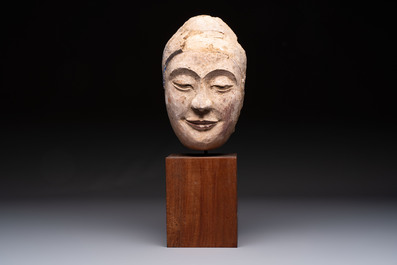 A Thai polychrome stucco head of Buddha, Ayutthaya Kingdom, 16/17th C.