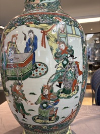 A large Chinese famille verte vase with narrative design, 19th C.
