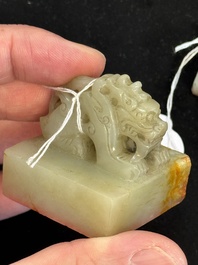 A Chinese celadon and russet jade 'dragon' seal, 18/19th C.