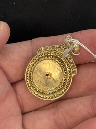 A diamond- and jadeite-inlaid gold pendant, 20th C.
