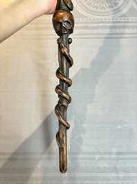 A finely carved boxwood 'vanitas' or 'memento mori' stick, 18/19th C.