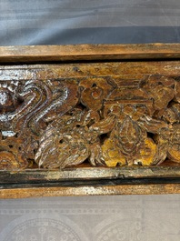 Two Tibetan polychromed wooden folding tables with dragon design, 19/20th C.
