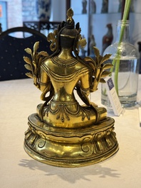 A fine Sino-Tibetan turquoise- and coral-inlaid gilt-bronze Buddha Maitreya, Kangxi