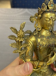 A fine Sino-Tibetan turquoise- and coral-inlaid gilt-bronze Buddha Maitreya, Kangxi