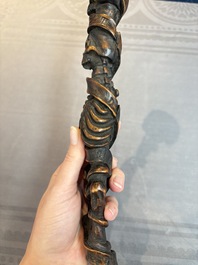 A finely carved boxwood 'vanitas' or 'memento mori' stick, 18/19th C.