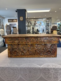 Two Tibetan polychromed wooden folding tables with dragon design, 19/20th C.