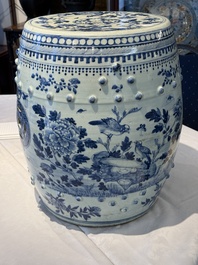 A Chinese blue and white 'birds among flowering branches' garden seat, 19th C.