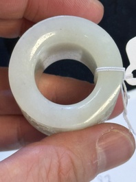 A fine Chinese white jade inscribed archer ring, Zigang 子岡 mark, 18th C.