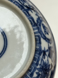 A pair of Chinese blue and white saucer dishes, Qianlong mark, 19th C.