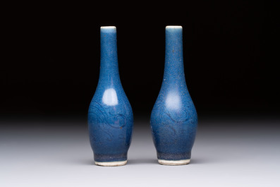 A pair of Chinese blue-glazed 'Hatcher Cargo' vases with incised dragons, Transitional period