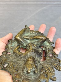 A Tibetan or Nepalese bronze seated Tara holding a vajra, 12/13th C.