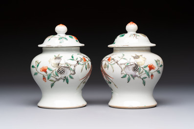 A pair of Chinese famille verte covered jars, a Tieguai Li figure, a blue and white teapot and a biscuit saucer, Kangxi and Qing Yu Tang mark, 19th C.