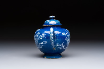 A Nevers white-decorated blue-ground faience teapot and cover, France, 18th C.