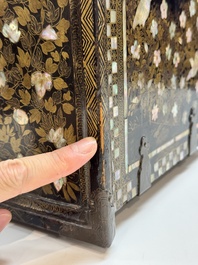 A Japanese Nanban portable lacquer cabinet, Momoyama, late 16th/early 17th C.