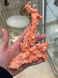 A Chinese carved red coral 'dragon' group, 19/20th C.