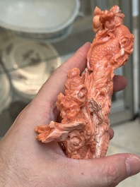 A Chinese carved red coral 'dragon' group, 19/20th C.