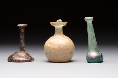 Eight Roman glass flasks, three glass bracelets and two bronze rings, 1st/4th C.