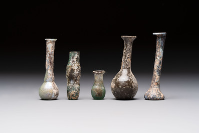 Eight Roman glass flasks, three glass bracelets and two bronze rings, 1st/4th C.