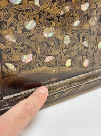 A Japanese Nanban portable lacquer cabinet, Momoyama, late 16th/early 17th C.