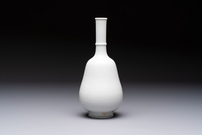 A Chinese famille rose 'Shoulao' bottle vase, signed Wang Qi 王琦, Taozhai 匋斋 seal mark, dated 1943