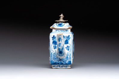 A rare blue and white Dutch Delft relief-moulded teapot and cover, late 17th C.