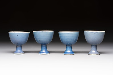 Four Chinese blue-glazed 'Hatcher Cargo' stem cups, Transitional period