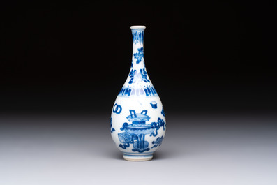 A group of 12 Chinese blue and white miniature vases and a small bottle vase, Kangxi